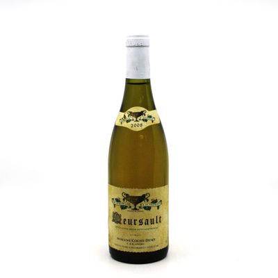 a bottle of wine that is sitting on a table