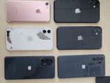 many different colors of iphones on the table