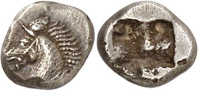 a silver coin with an image of a woman on it