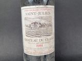 a bottle of wine that is sitting on a table