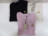 three t - shirts on a shelf with a price tag on it