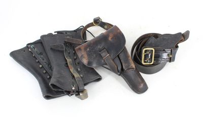pair of leather holsters and belt on a white background
