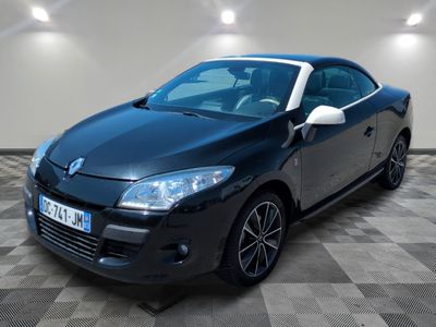 a picture of a black car parked in a garage