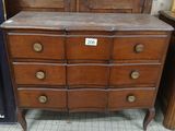 an image of a dresser with drawers and a mirror on top of it