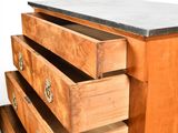 an image of a wooden dresser with four drawers and a marble top