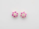une paire de boucles d'oreilles à clous en saphir rose et diamants