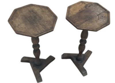pair of antique wooden tables with turned legs and a wooden table top