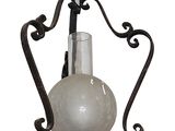 an image of a light hanging from a ceiling with a glass shade