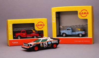 two toy cars that are sitting in a box