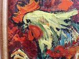 a painting of a rooster in a frame on the wall