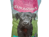 a bag of dog food with a black dog on it