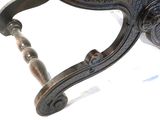 a close up of a wooden table with a metal handle