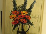 a picture of a painting of flowers in a vase
