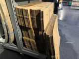 a lot of boxes that are sitting on a cart