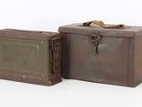 these are two old tins that are sitting next to each other