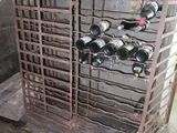 a wine rack that has many bottles of wine in it