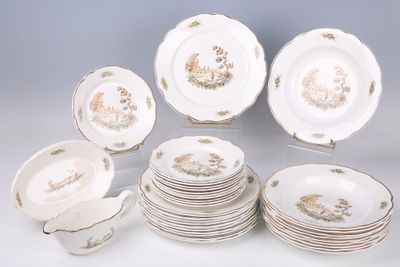 a lot of plates and cups on the table