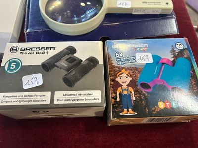 a box with a magnifying glass and a box with a magnifying glass on it