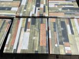 four pieces of wood sitting on top of a table
