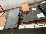 two laptops that are sitting on a table