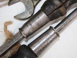 a lot of tools that are sitting on a table