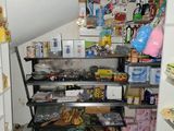 an image of a room with a lot of stuff on the floor