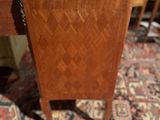 an old wooden table with a drawer on top of it