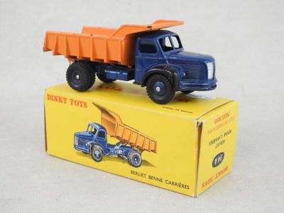 a toy truck that is sitting on top of a box