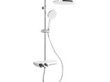 a close up of a shower head with a hand shower