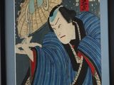 painting of a woman holding a parasol in her right hand