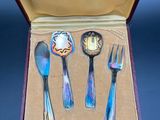 a box with a set of silverware in it