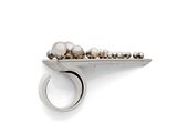 silver ring with pearls and a crescent on a white background