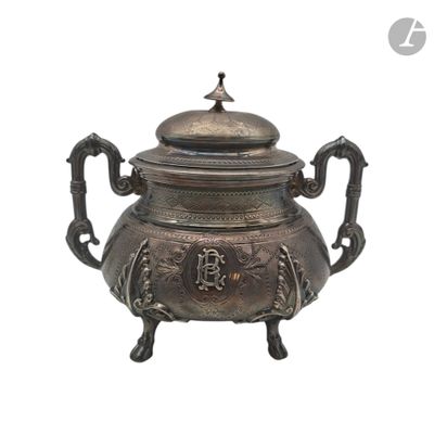 an image of a metal teapot with a lid on a white background