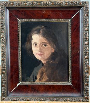 portrait of a young girl in a brown coat by person