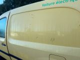 a van that is parked on the side of the road