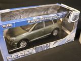 a box with a toy car in it on a table