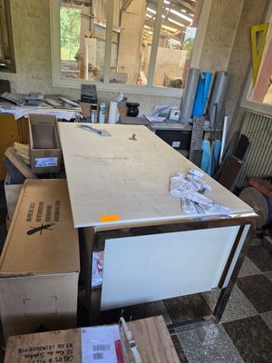 a table that is sitting in the middle of a room