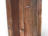 a wooden door with a metal handle on a white background