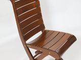brown wooden folding chair against a white background