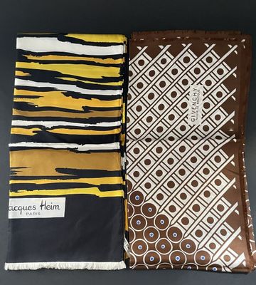 two pieces of african print fabric, one brown and one white