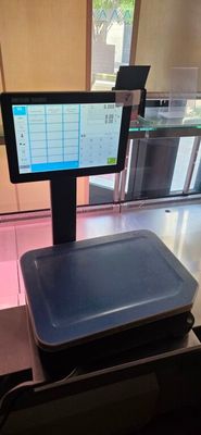 an image of a scale with a laptop on it