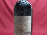 a bottle of wine that is sitting on a table