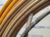 a close up of a bunch of wires on the ground