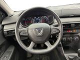 dashboard of a car with a steering wheel and dashboard gauges