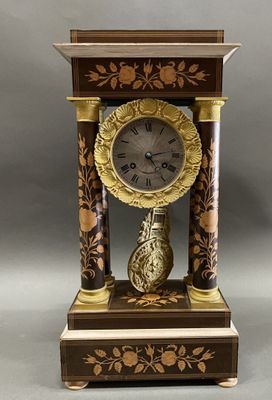 a clock that is sitting on top of a table