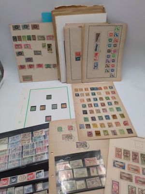 many different types of stamps on a table