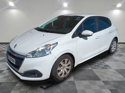 a picture of a white car parked in a garage