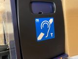 a black box with a blue sticker on it