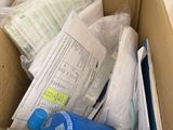 a cardboard box with a lot of items inside of it
