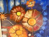 une peinture de fleurs dans un vase sur une table